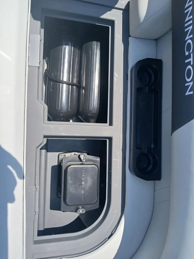 Slide: The Image of Close-up of a storage compartment on a Bennington 20SL boat. - 29