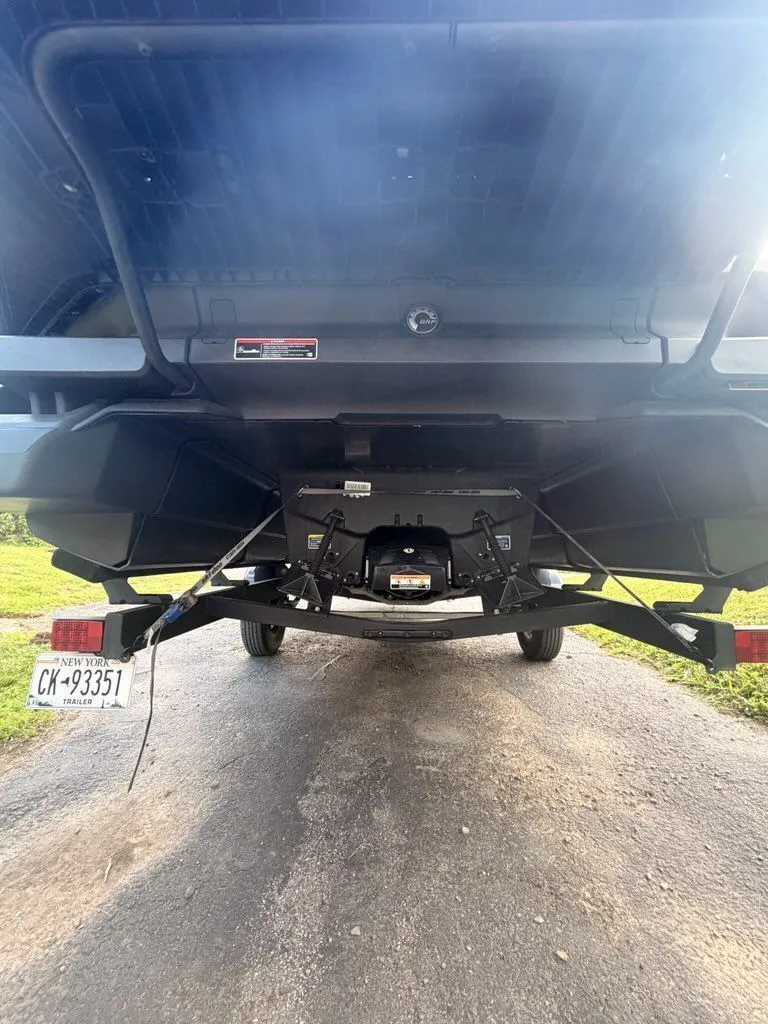 Slide: The Image of Underside of a 2023 Sea-Doo Switch Sport on a trailer, showing the chassis. - 16