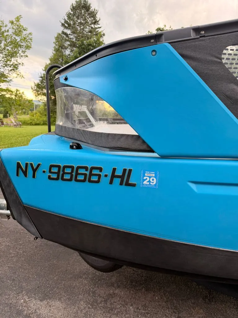 Slide: The Image of Close-up of the blue 2023 Sea-Doo Switch Sport with registration number NY-9866-HL. - 18
