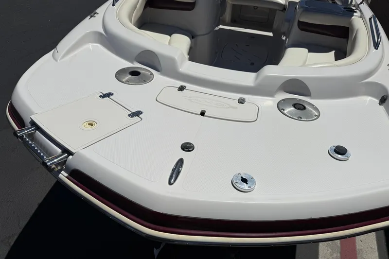 Slide: The Image of 2010 Tahoe 195 boat deck with seating and storage compartments. - 8