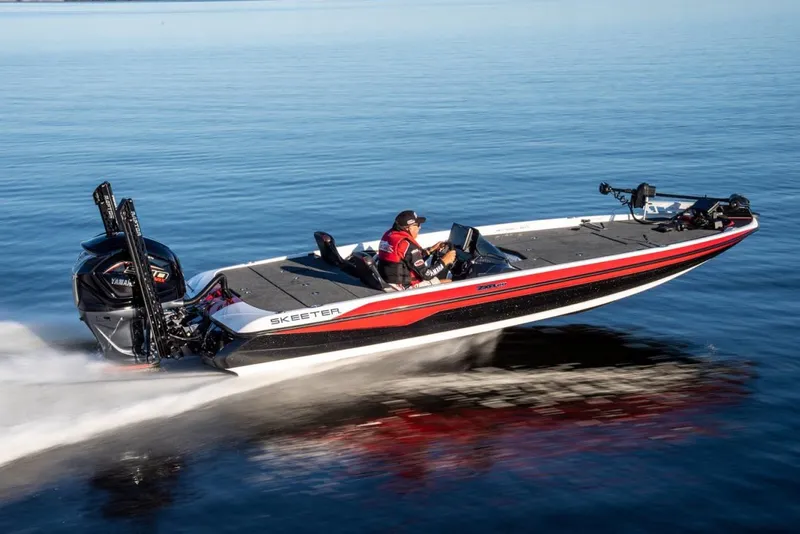Slide: The Image of Manufacturer Provided Image: 2022 Skeeter ZXR 20 bass boat speeding on a calm lake. - 4