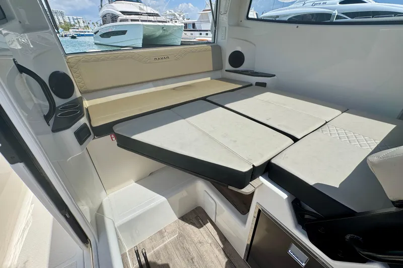 Slide: The Image of Interior of 2026 Navan C30 boat with convertible seating and modern design. - 27