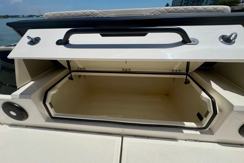 Slide: The Image of Open storage compartment on a 2026 Navan C30 boat, featuring sleek design and ample space. - 11
