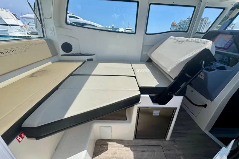 Slide: The Image of Interior of 2026 Navan C30 boat with beige seating and modern design. - 26