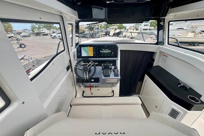 Slide: The Image of Interior of 2026 Navan C30 boat with modern navigation controls and seating. - 33