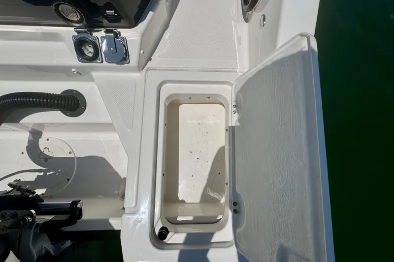 Slide: The Image of Open storage compartment on a 2026 Navan C30 boat, showing interior details. - 51