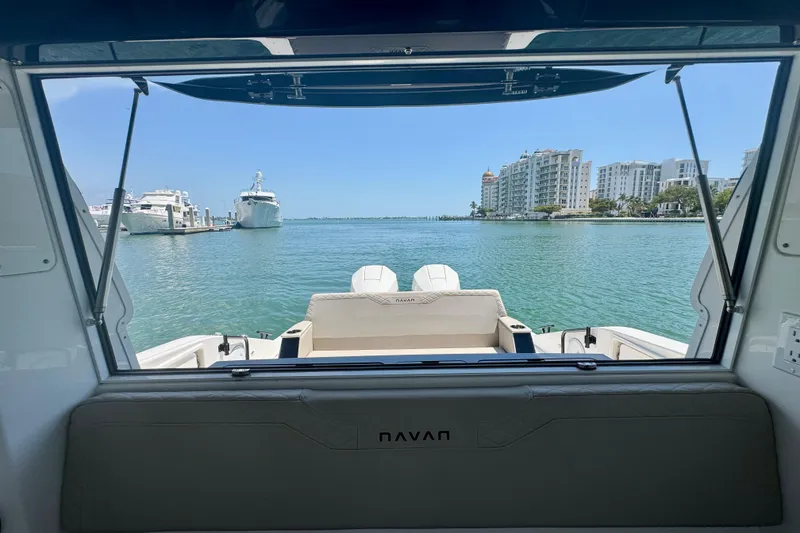 Slide: The Image of View from Navan C30 boat, overlooking marina and waterfront buildings, 2026 model. - 21