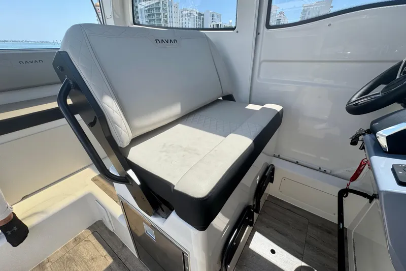 Slide: The Image of Interior of 2026 Navan C30 boat with modern seating and steering wheel. - 29