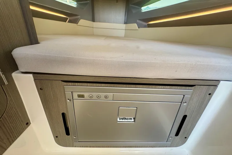 Slide: The Image of Interior of 2026 Navan C30 featuring a compact built-in refrigerator. - 41