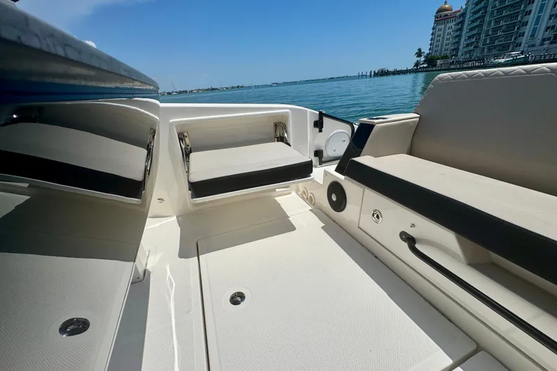 Slide: The Image of Interior view of 2026 Navan C30 boat with seating and ocean backdrop. - 15