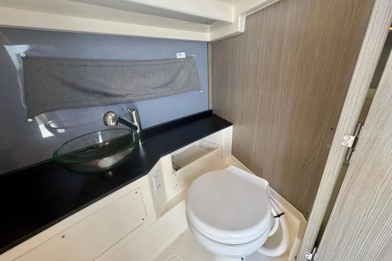 Slide: The Image of Modern bathroom in 2026 Navan C30 with glass sink and compact toilet. - 44