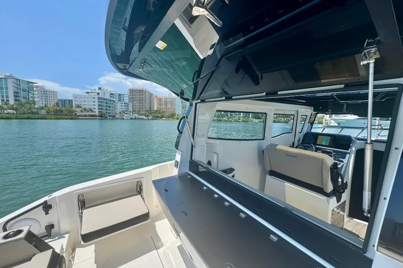Slide: The Image of Interior view of 2026 Navan C30 boat with open deck and modern seating. - 17