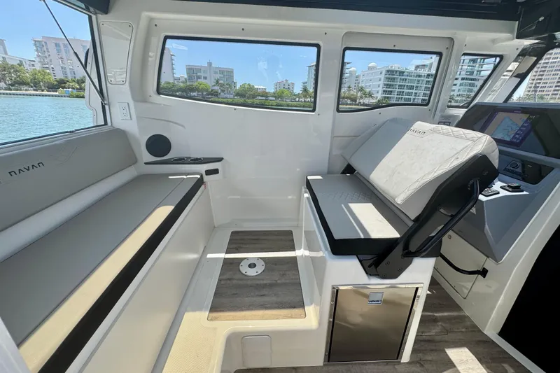 Slide: The Image of Interior of 2026 Navan C30 boat with modern seating and navigation system. - 18