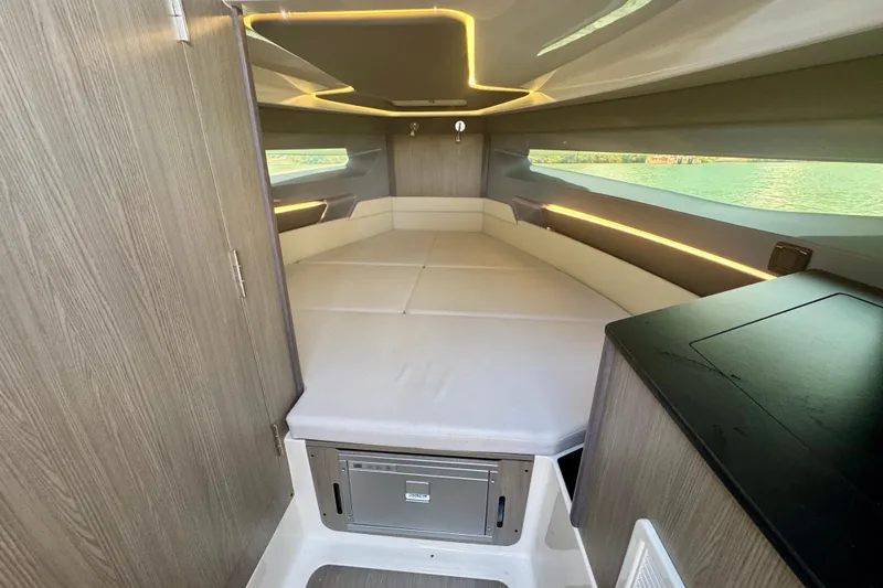 Slide: The Image of Interior cabin of 2026 Navan C30 boat with modern design and ambient lighting. - 38