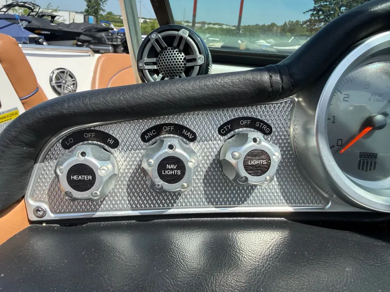 Slide: The Image of The image shows the dashboard of a 2016 MasterCraft X30 with various switches and a speaker. - 45