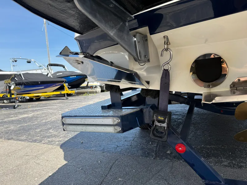 Slide: The Image of The image shows the rear of a 2016 MasterCraft X30 on a trailer. - 23