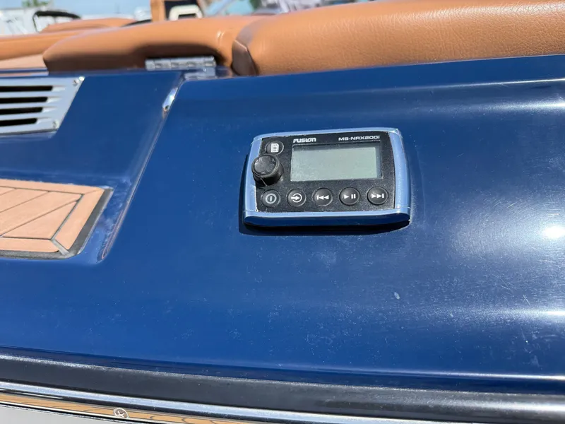 Slide: The Image of Close-up of a blue dashboard with a Fusion MS-NRX200i control unit. - 22