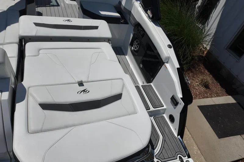 Slide: The Image of 2017 Monterey 258SS Super Sport boat interior with white seating and sleek design. - 11