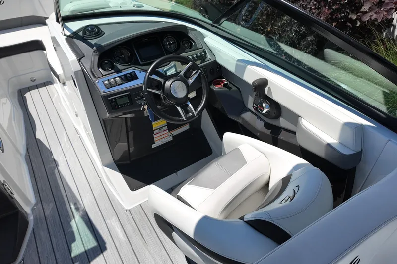 Slide: The Image of 2017 Monterey 258SS Super Sport boat cockpit with modern steering and controls. - 27