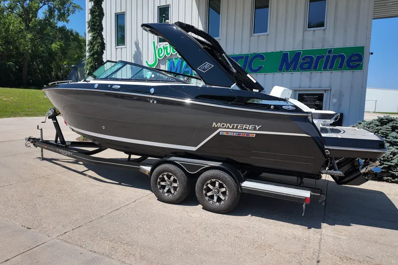 Slide: The Image of 2017 Monterey 258SS Super Sport boat on trailer outside marine dealership. - 2