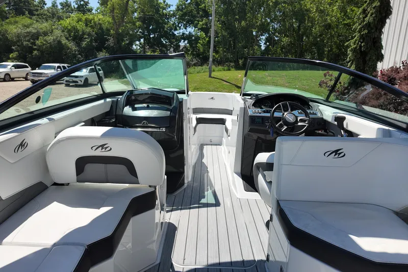 Slide: The Image of 2017 Monterey 258SS Super Sport boat interior with sleek seating and modern dashboard design. - 17