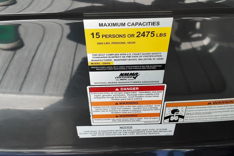 Slide: The Image of Capacity label on 2017 Monterey 258SS Super Sport boat, max 15 persons or 2475 lbs. - 25