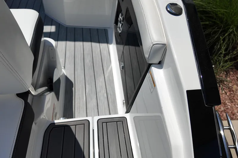 Slide: The Image of 2017 Monterey 258SS Super Sport boat interior with sleek seating and modern flooring. - 13