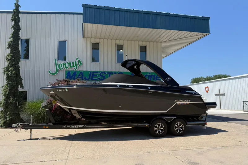 Slide: The Image of 2017 Monterey 258SS Super Sport boat on trailer outside Jerry's Majestic Marine. - 3
