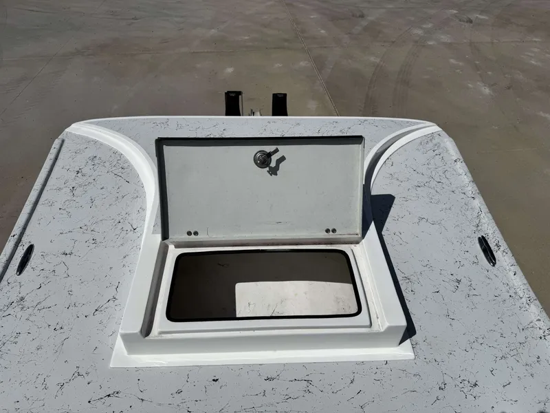 Slide: The Image of Boat surface with an open hatch revealing a storage compartment. - 20