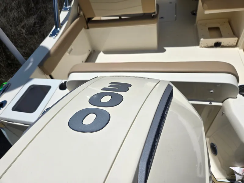 Slide: The Image of Close-up of a boat interior with a 300 horsepower engine. - 21