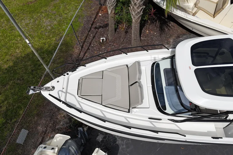 Slide: The Image of Aerial view of 2026 Navan S30 boat with cushioned seating on deck. - 5
