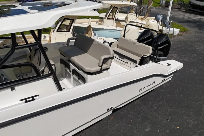 Slide: The Image of 2026 Navan S30 boat with dual Mercury engines and spacious seating. - 7