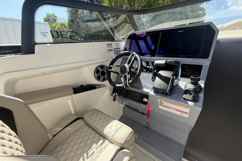 Slide: The Image of Interior of 2026 Navan S30 boat with modern steering and control panel. - 11