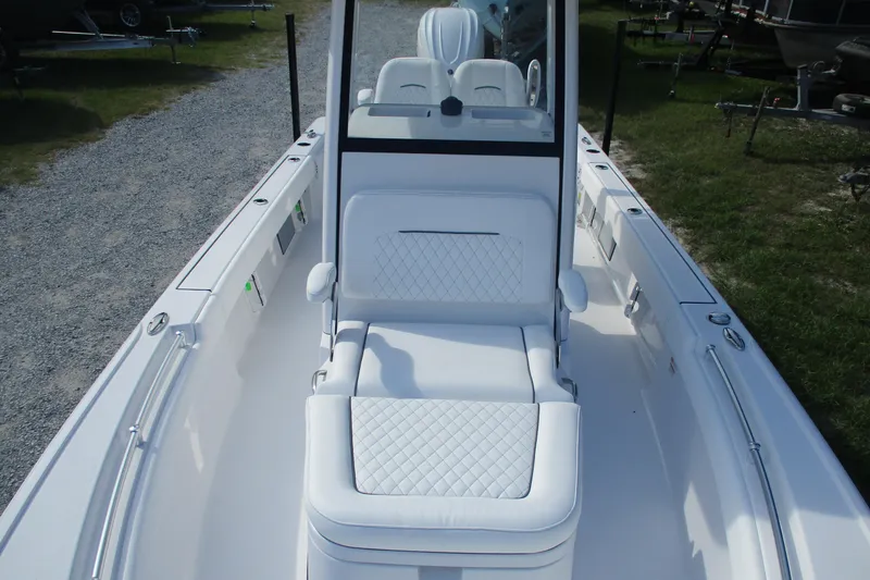 Slide: The Image of 2026 Sportsman Masters 247OE Bay Boat with luxurious seating and sleek design. - 5