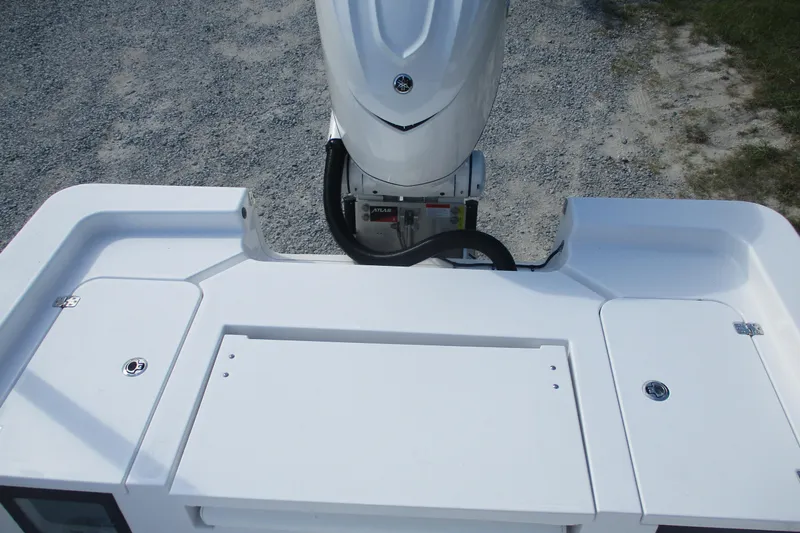 Slide: The Image of 2026 Sportsman Masters 247OE Bay Boat engine and deck view, showcasing sleek design. - 8
