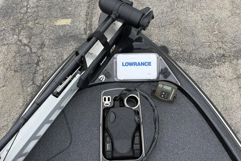 Slide: The Image of 2014 Skeeter FX210 boat deck with Lowrance electronics and trolling motor. - 14