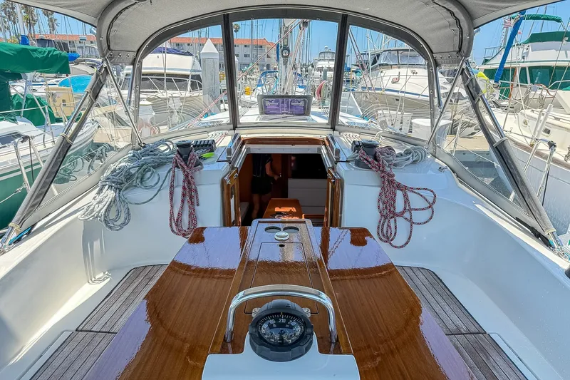 Slide: The Image of Cockpit view of 2014 Bavaria Cruiser 37 sailboat docked at marina. - 35