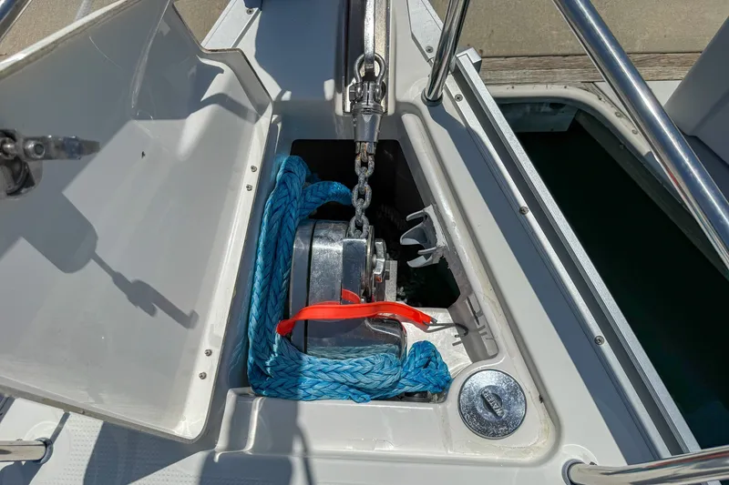 Slide: The Image of Anchor locker of 2014 Bavaria Cruiser 37 with chain and blue rope. - 46