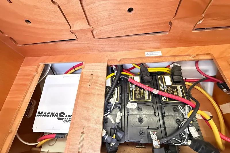Slide: The Image of Electrical system of a 2014 Bavaria Cruiser 37 yacht, featuring batteries and wiring. - 53
