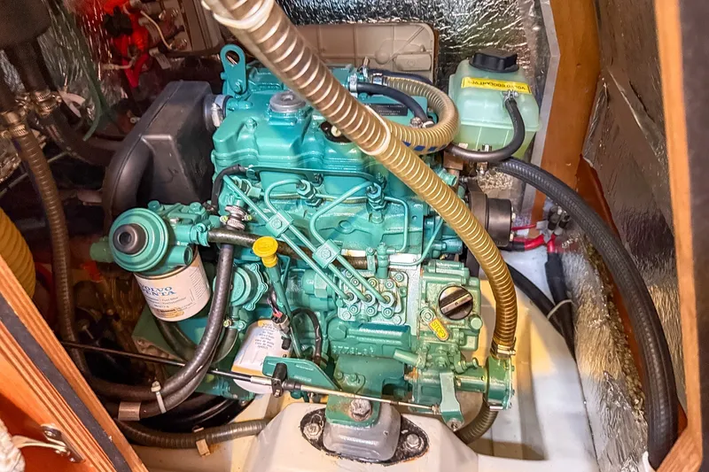 Slide: The Image of Engine compartment of a 2014 Bavaria Cruiser 37 sailboat, featuring a Volvo Penta engine. - 29