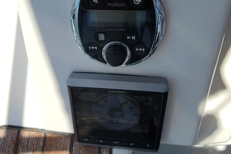 Slide: The Image of Close-up of a Fusion audio system and Garmin navigation device on a 2014 Bavaria Cruiser 37. - 33