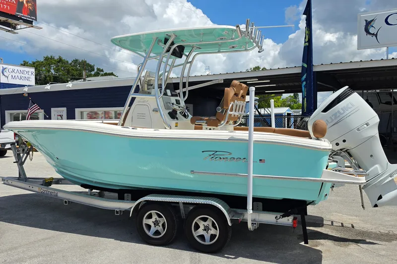 Slide: The Image of 2026 Pioneer 222 Sportfish boat on trailer, displayed at Grander Marine dealership. - 3