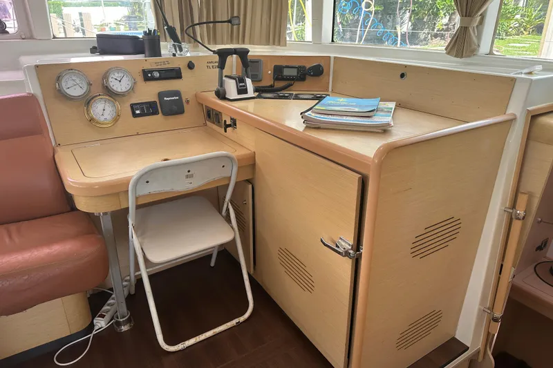 Slide: The Image of Interior of a 2010 Lagoon 440 yacht with navigation station and instruments. - 37