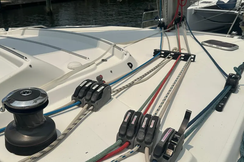 Slide: The Image of Deck of 2010 Lagoon 440 catamaran with ropes and winch system. - 21