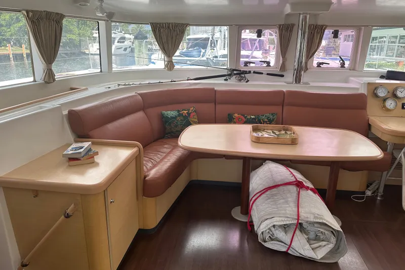 Slide: The Image of Interior of 2010 Lagoon 440 yacht with cozy seating and nautical decor. - 36