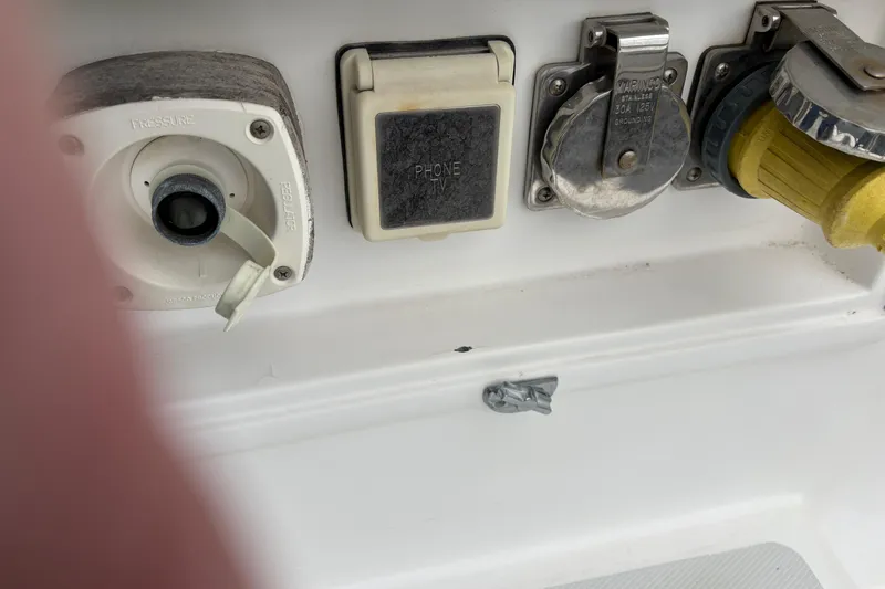 Slide: The Image of Boat utility panel with phone and power connections, CHB Ponderosa 1986 model. - 8