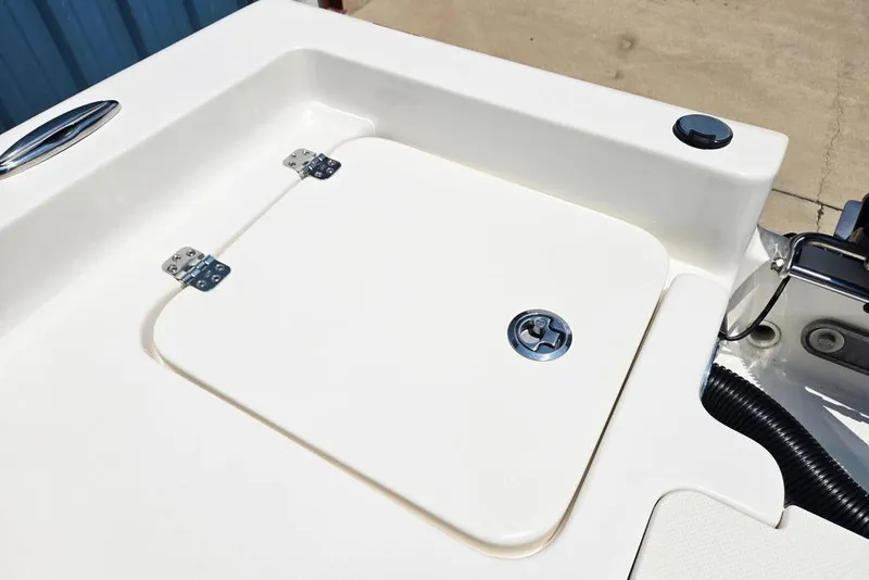 Slide: The Image of 2023 Key West 188 Bay Reef boat hatch detail with stainless steel hinges and latch. - 42