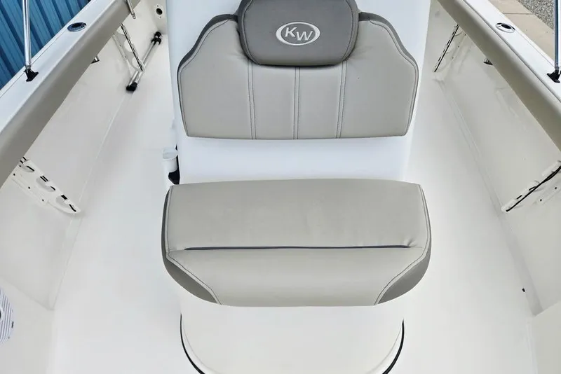 Slide: The Image of 2023 Key West 188 Bay Reef boat seat with gray upholstery and KW logo. - 11