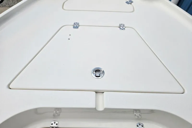Slide: The Image of 2023 Key West 188 Bay Reef boat deck with storage compartment and latch. - 25