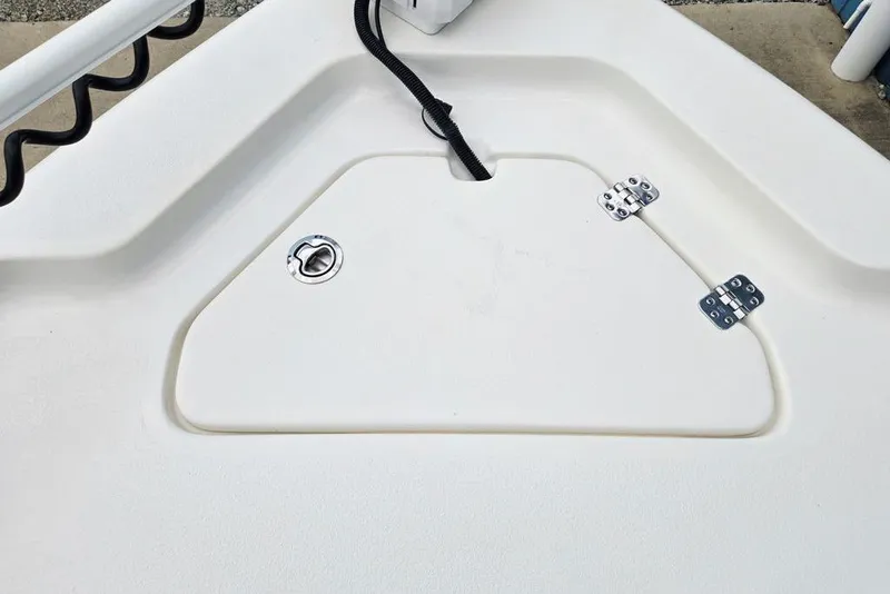 Slide: The Image of 2023 Key West 188 Bay Reef boat deck with storage compartment and hinges. - 24